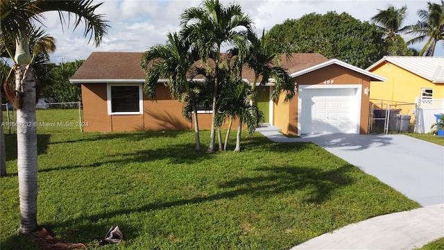 single story home featuring a front lawn