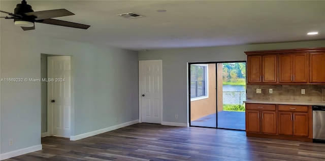 kitchen featuring backsplash, ceiling fan, dishwasher, and dark hardwood / wood-style floors