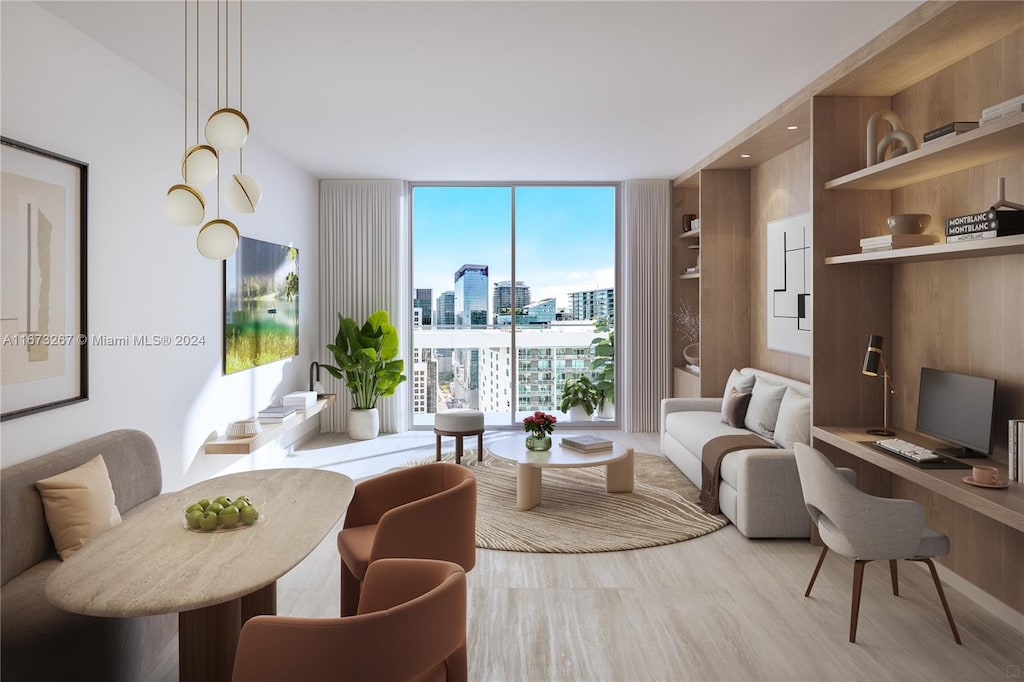 living room with expansive windows, built in desk, and light hardwood / wood-style floors