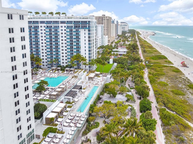 aerial view featuring a water view and a view of the beach