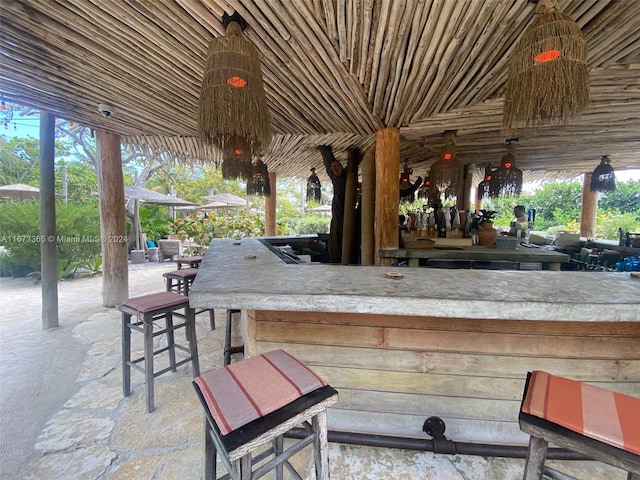 view of patio / terrace featuring an outdoor bar