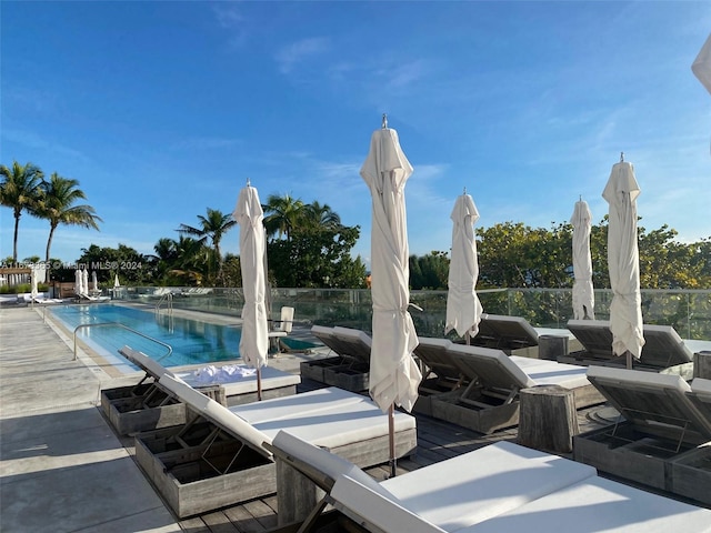 view of swimming pool featuring a patio