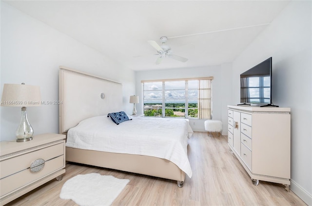 bedroom featuring light wood-type flooring and ceiling fan