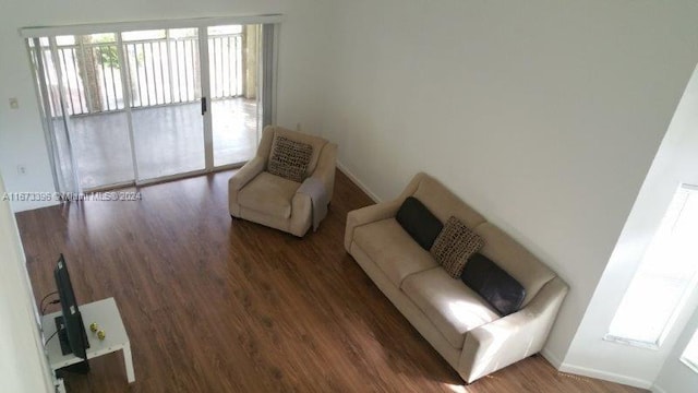 3204 Glenmoor Dr Unit 3204, West Palm Beach, FL 33409 - unfurnished room featuring wood finished floors and baseboards