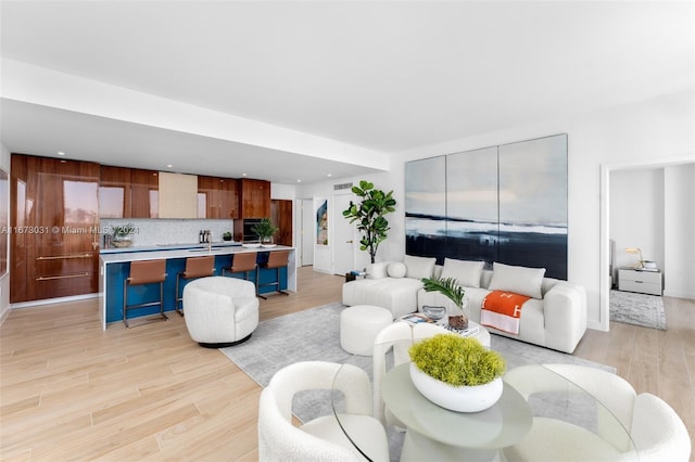 2678 Tigertail Ave Unit 1504B, Miami, FL 33133 - living room featuring light wood-style flooring and recessed lighting