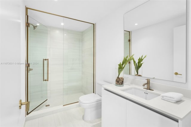 2678 Tigertail Ave Unit 1504B, Miami, FL 33133 - full bathroom featuring vanity, toilet, a stall shower, and recessed lighting