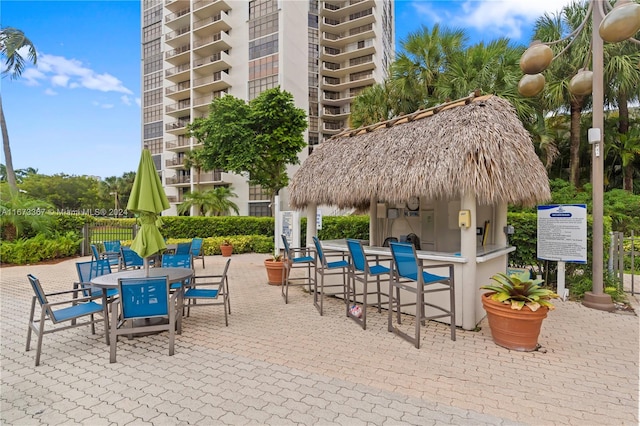 view of patio with a bar