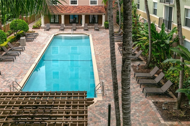 view of pool featuring a patio