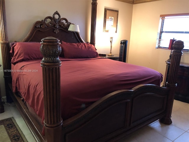 bedroom featuring light tile patterned floors