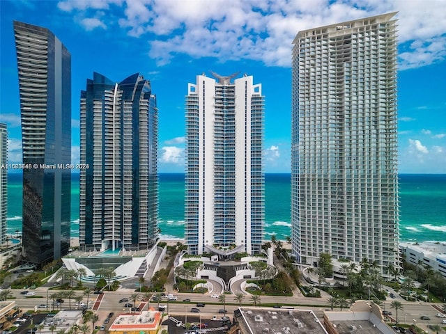 property's view of city featuring a water view