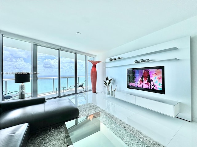 living room featuring tile patterned floors and floor to ceiling windows