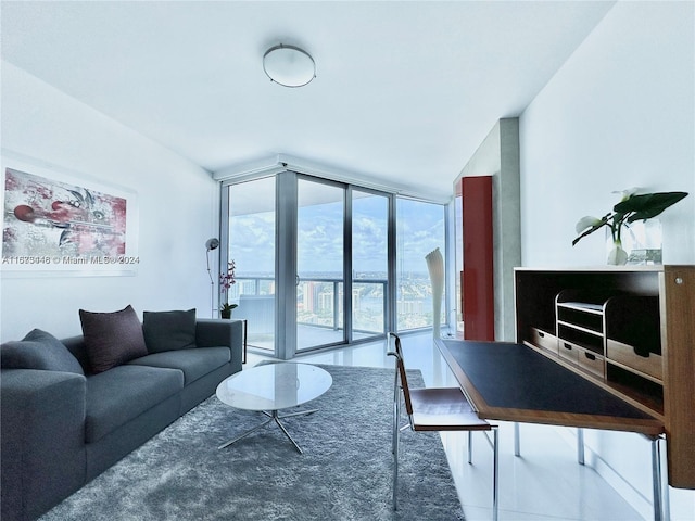 tiled living room featuring expansive windows