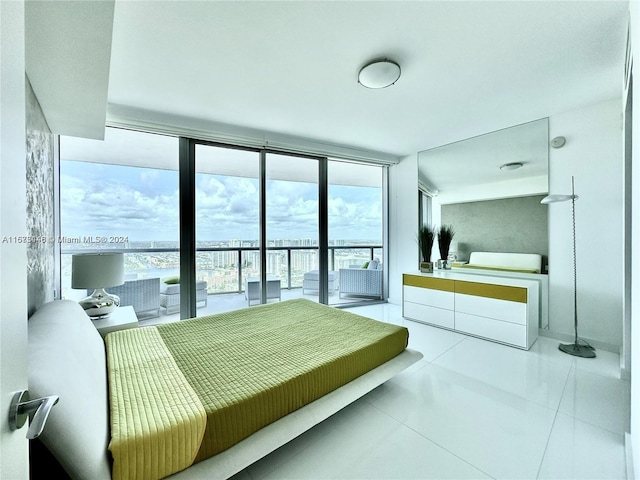 tiled bedroom with floor to ceiling windows, access to outside, and multiple windows