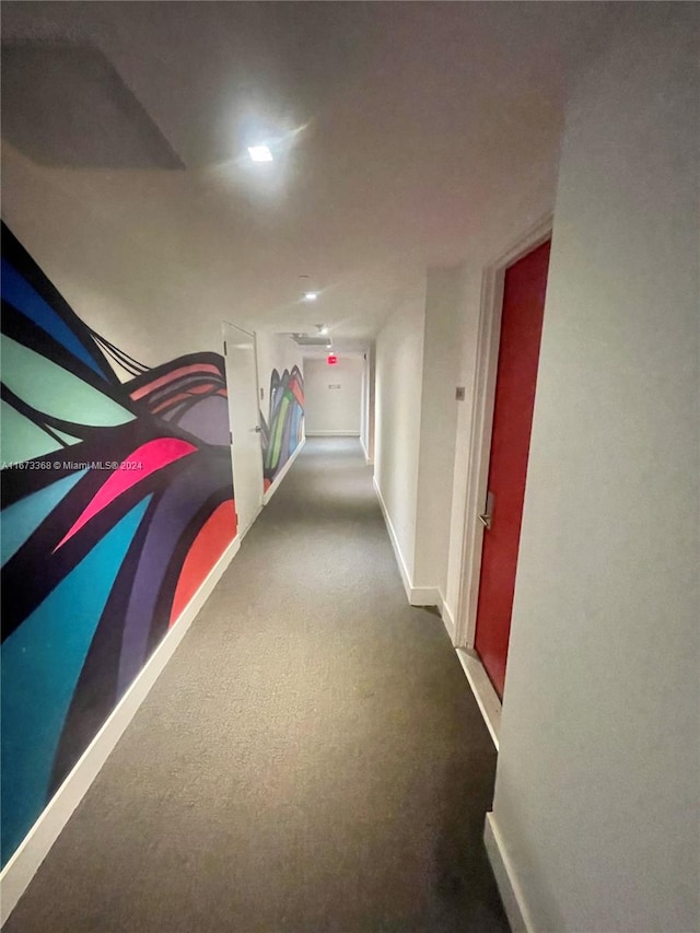 hallway featuring carpet