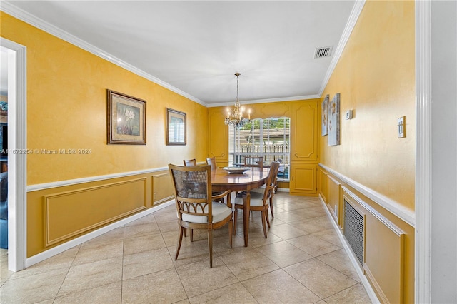 dining area featuring visible vents, crown molding, a decorative wall, and light tile patterned flooring