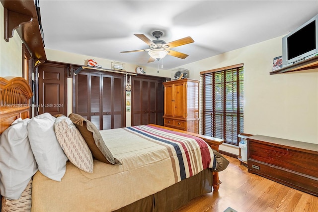 bedroom featuring light wood-type flooring and ceiling fan