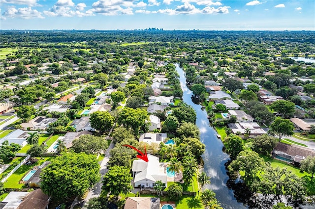 aerial view featuring a water view and a residential view