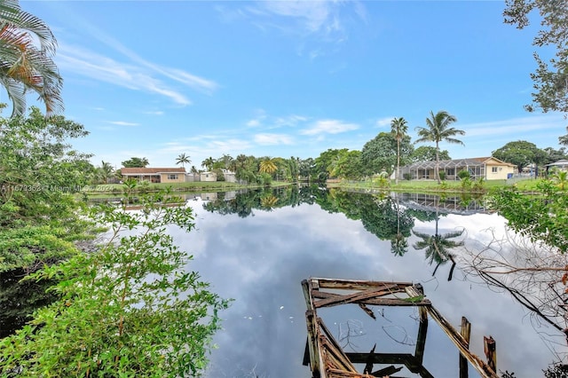 property view of water with a dock