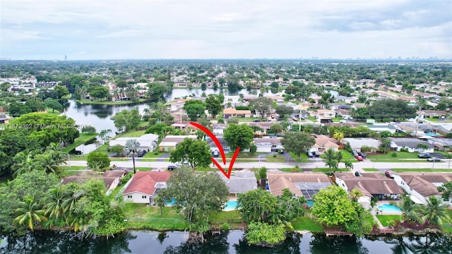 drone / aerial view featuring a water view