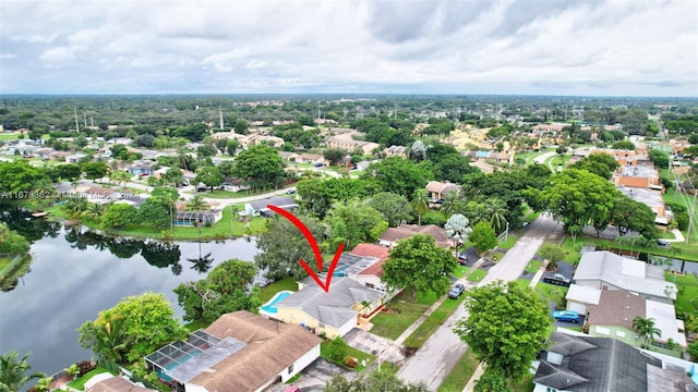 birds eye view of property featuring a water view