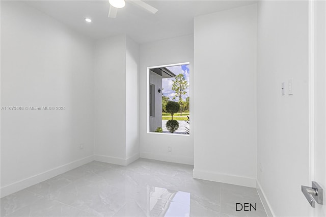 unfurnished room featuring ceiling fan