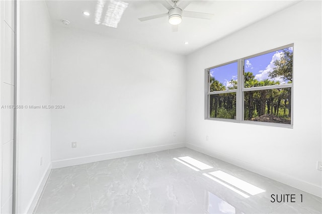 unfurnished room featuring ceiling fan