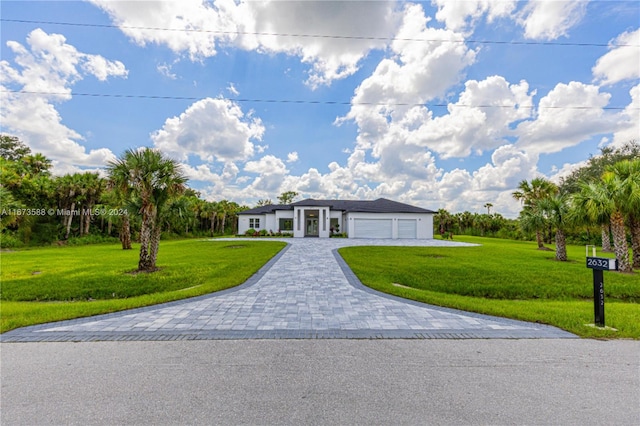 ranch-style home featuring a front yard