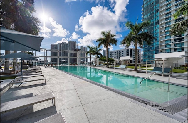 view of swimming pool featuring a patio