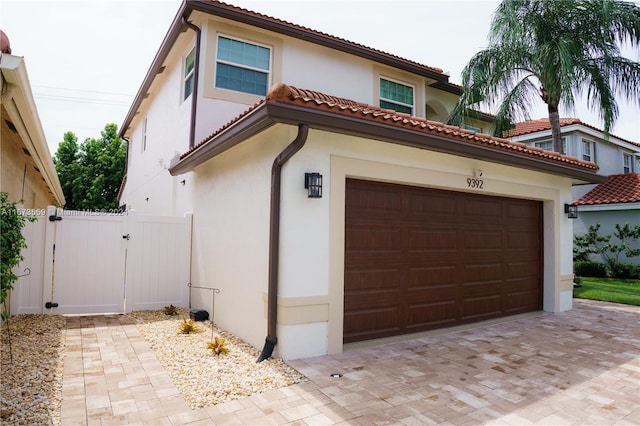 exterior space with a garage