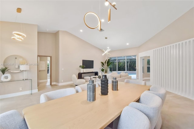 dining space featuring lofted ceiling