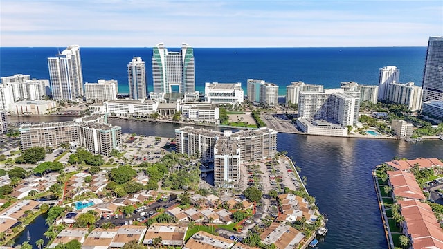 drone / aerial view with a water view