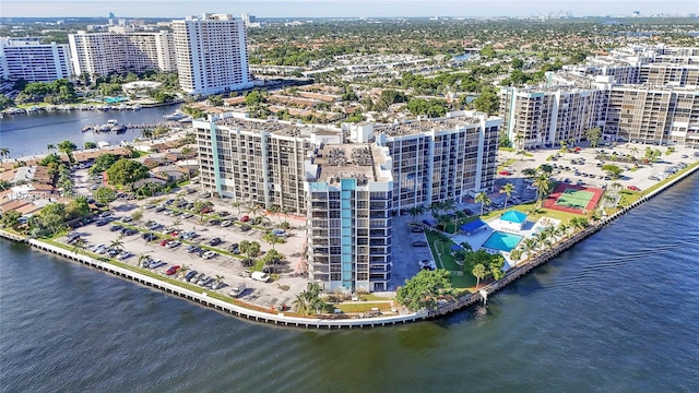 birds eye view of property featuring a water view