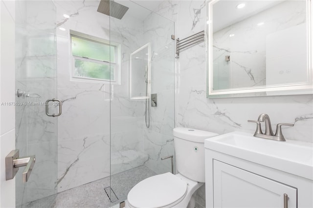 bathroom featuring vanity, toilet, tile walls, and an enclosed shower