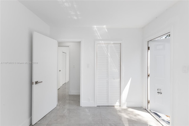 unfurnished bedroom featuring a closet