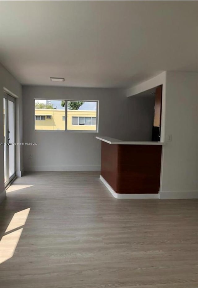 empty room with light wood-type flooring