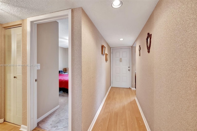 hall featuring light hardwood / wood-style flooring