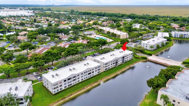 bird's eye view with a water view