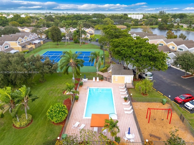 birds eye view of property featuring a water view