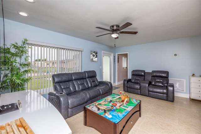 living room with light tile patterned flooring and ceiling fan