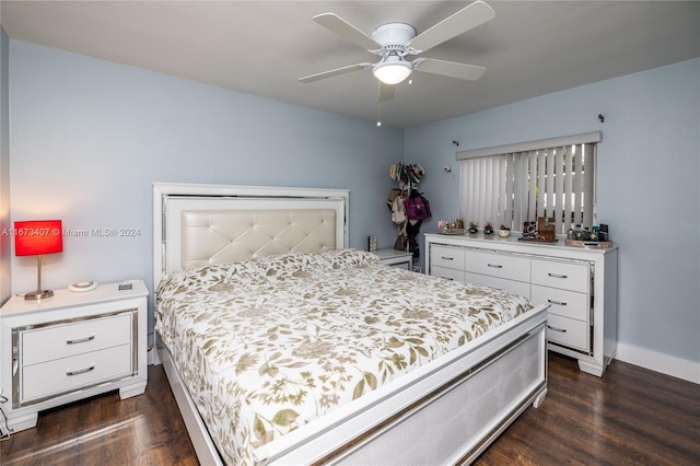 bedroom featuring ceiling fan and dark wood-type flooring