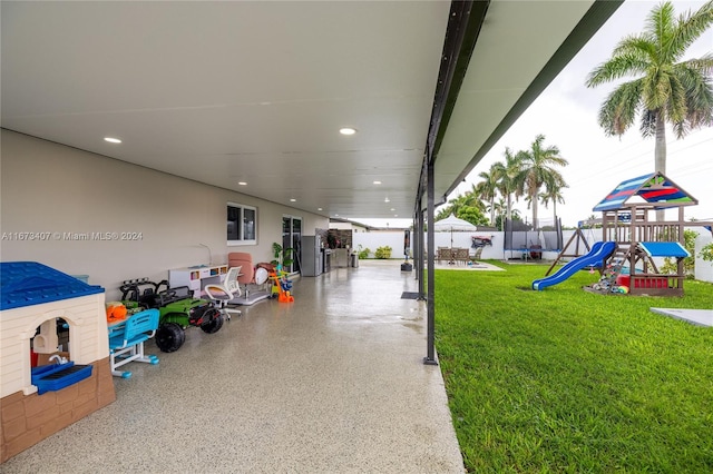 view of patio with a playground