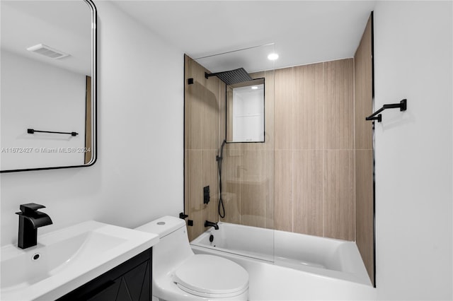 full bathroom with shower / bathing tub combination, vanity, and toilet