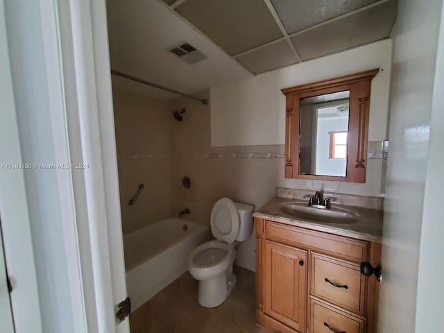 full bathroom with shower / bathtub combination, vanity, and toilet