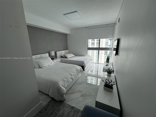 bedroom with a textured ceiling