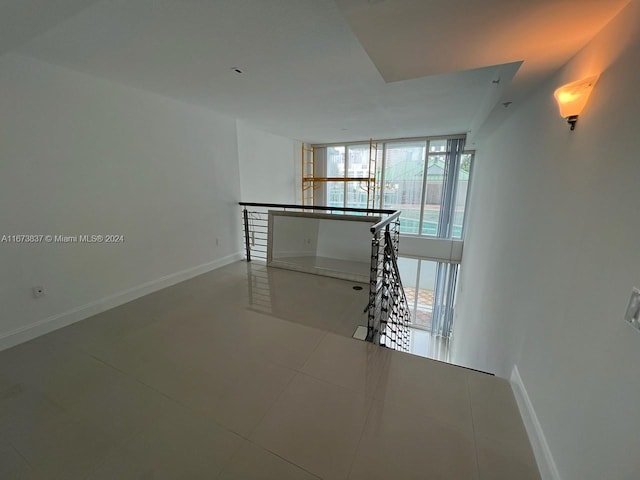 empty room featuring tile patterned floors