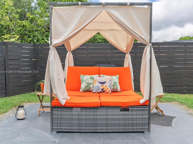 view of patio featuring outdoor lounge area and a gazebo