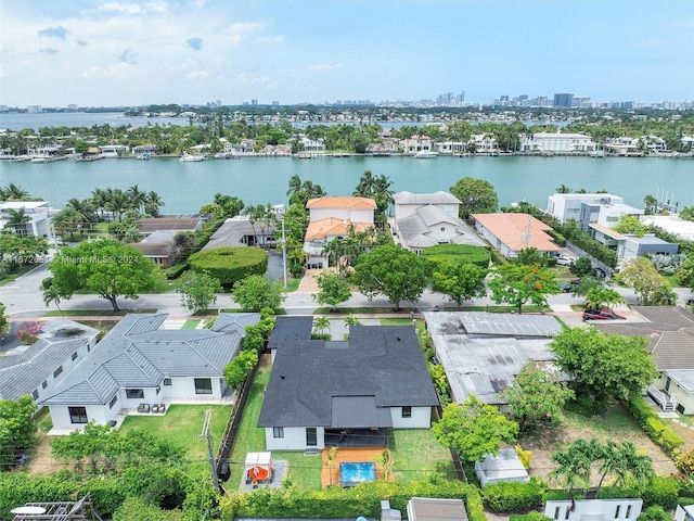 birds eye view of property featuring a water view