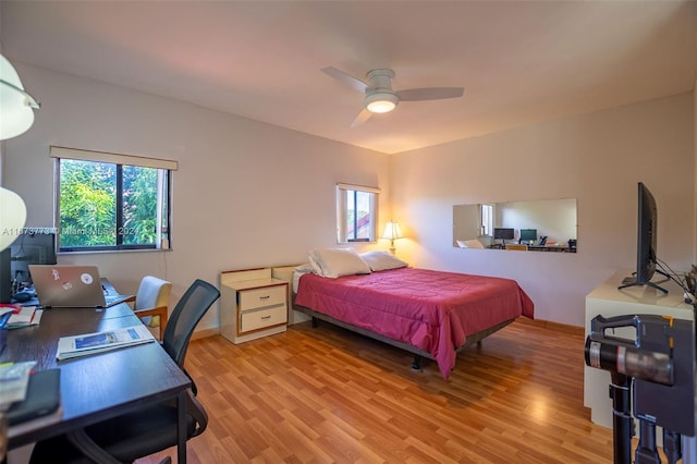 bedroom featuring ceiling fan and light wood-type flooring