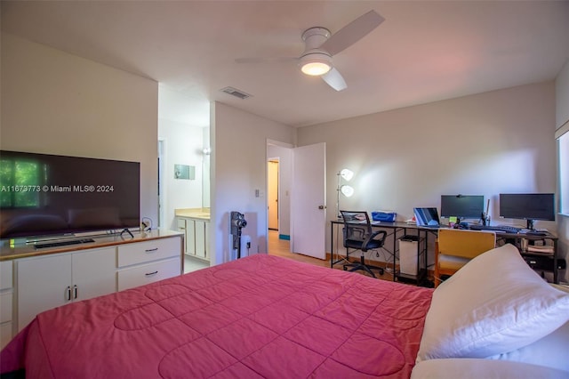 bedroom with ceiling fan and connected bathroom