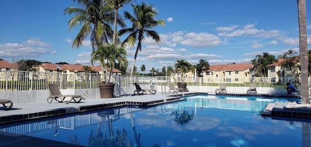 view of swimming pool featuring a patio